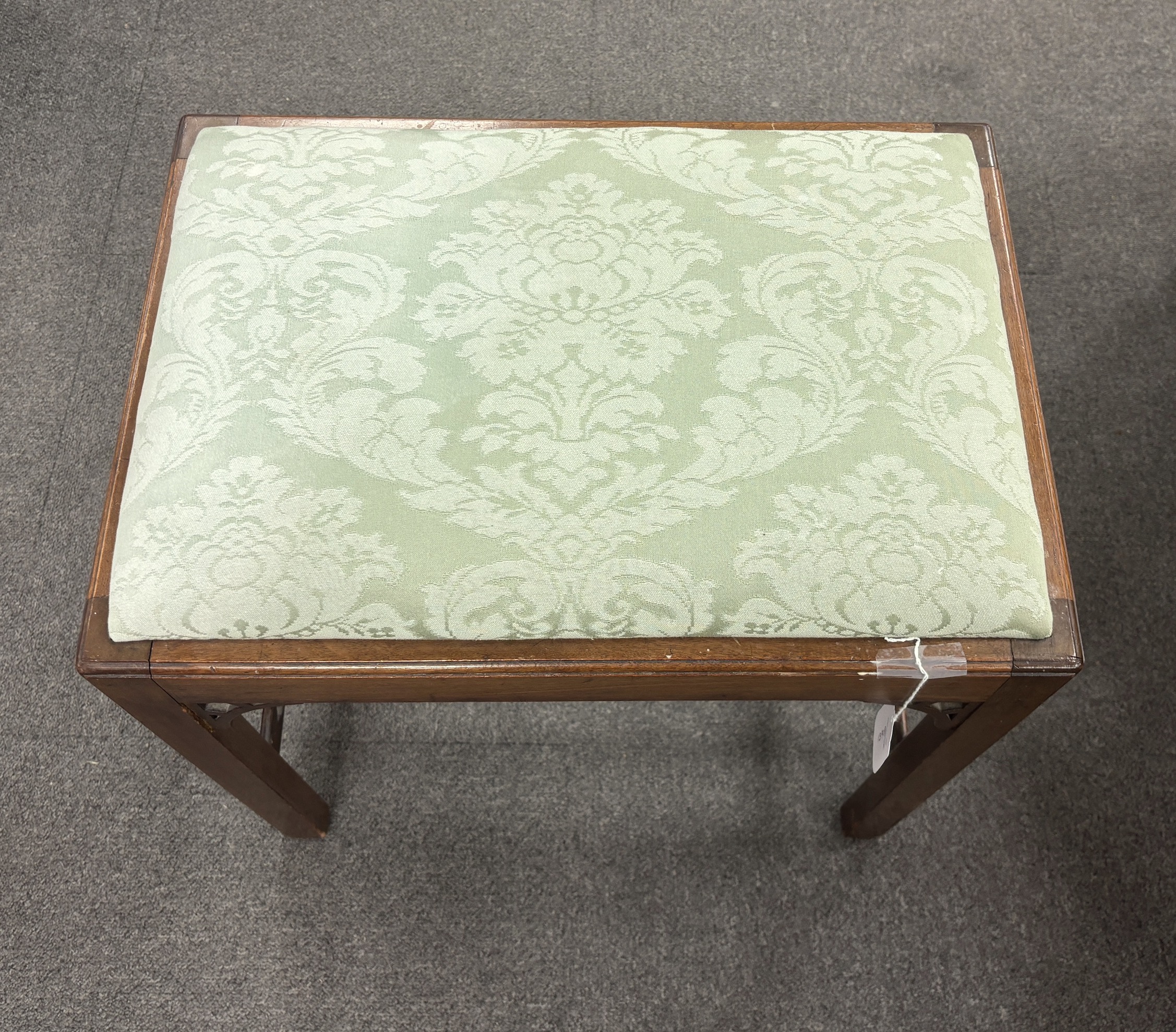 An Edwardian Chippendale Revival mahogany dressing stool, width 50cm, depth 35cm, height 50cm